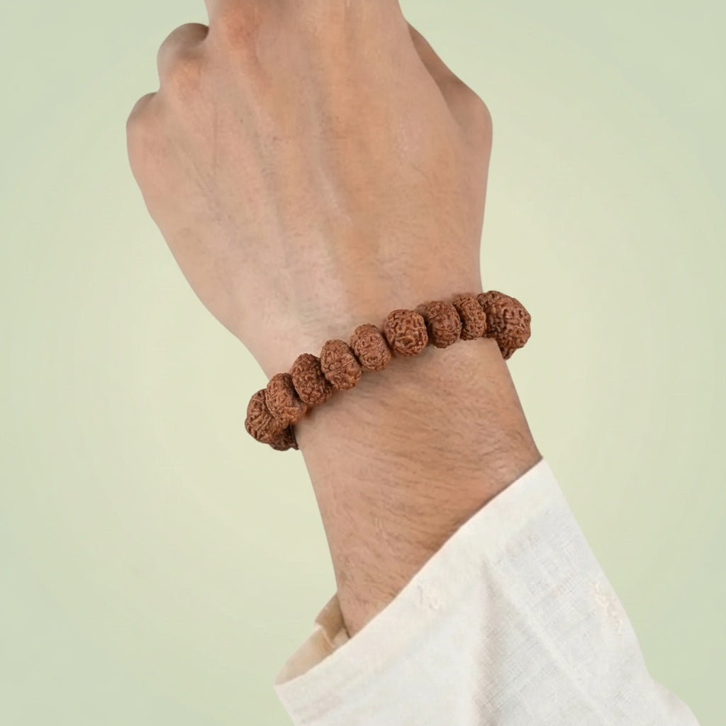 VASTUKOSHA 7 Mukhi Nepal Rudraksha bead bracelet worn on a wrist for spiritual practice and prosperity