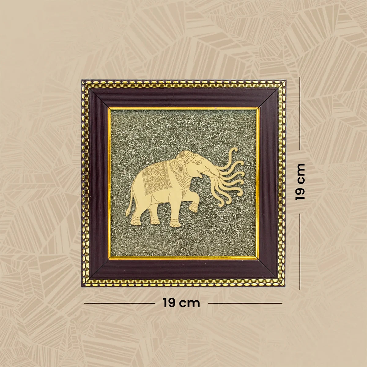 VASTUKOSHA 7 trunk Airavata elephant wall frame featuring gold-tone elephant motif on a textured raw pyrite background.