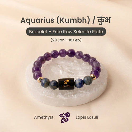 VASTUKOSHA Aquarius zodiac bracelet with purple amethyst and blue lapis lazuli beads on a raw selenite cleansing plate.