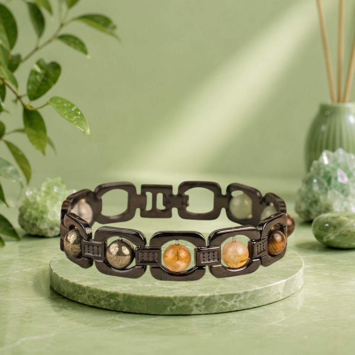 VASTUKOSHA Rishikesh Siddh Dhan Yog bracelet with black metal links and multi-colored healing crystals on fabric.