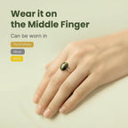 VASTUKOSHA natural cat's eye gemstone ring worn on a middle finger, suitable for silver, gold, or panchdhatu settings.