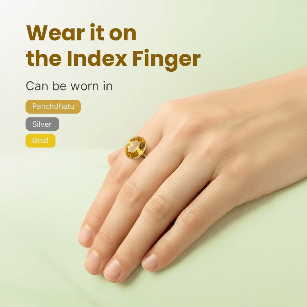 VASTUKOSHA natural citrine gemstone ring worn on the index finger, showcasing a golden-yellow oval stone setting.