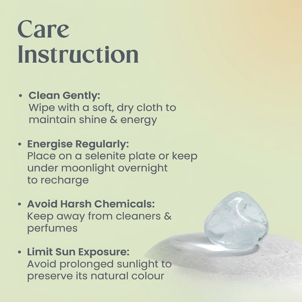 VASTUKOSHA care instructions for a natural clear quartz tumble stone displayed on a smooth grey pebble