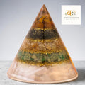 VASTUKOSHA conical Dhan Yog pyramid with layers of pyrite, tiger eye, citrine, green aventurine, and selenite base.