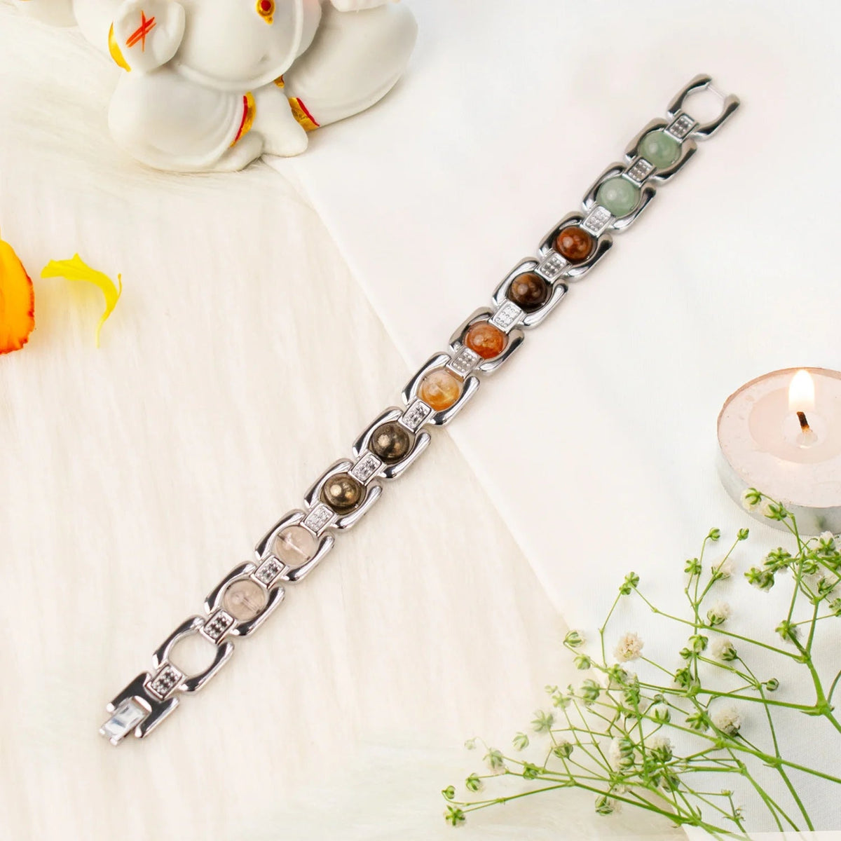 VASTUKOSHA Metal Dhan Yog bracelet featuring silver-plated links with Tiger Eye, Pyrite, Citrine, Quartz, and Aventurine.