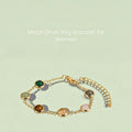 VASTUKOSHA Rishikesh Siddh Dhan Yog bracelet for women featuring multi-colored natural crystals on a gold-tone chain.