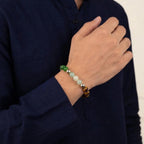 VASTUKOSHA Energised Dhan Yog crystal bracelet featuring tiger eye, pyrite, citrine, quartz, and green aventurine beads.