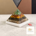 VASTUKOSHA Dhan Yog pyramid with layered crystals on a square raw selenite plate for wealth and energy cleansing