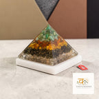 VASTUKOSHA Dhan Yog pyramid with layered crystals on a square raw selenite plate for wealth and energy cleansing