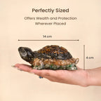 VASTUKOSHA Collector's Edition Dhan Yog tortoise made of Tiger Eye, Pyrite, Citrine, and Green Aventurine crystals.
