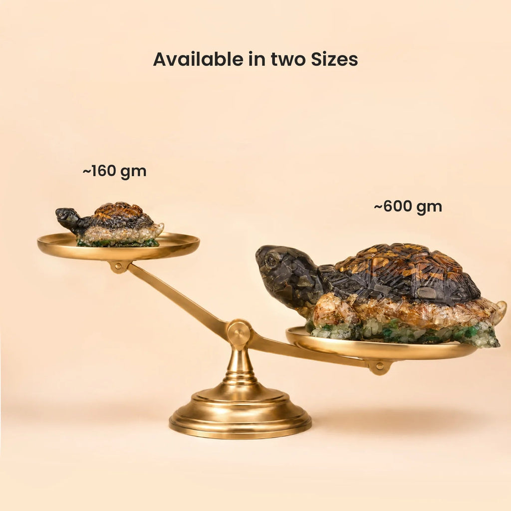 VASTUKOSHA Dhan Yog tortoise statues in two sizes, crafted from tiger eye, pyrite, citrine, and green aventurine.