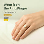 VASTUKOSHA fire opal gemstone ring worn on a finger, showcasing natural iridescence in a gold setting.