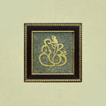 VASTUKOSHA Vighnaharta Ganesh wall frame featuring a gold-toned Ganesha silhouette set against textured raw pyrite.