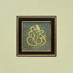 VASTUKOSHA Vighnaharta Ganesh wall frame featuring a gold-toned Ganesha silhouette set against textured raw pyrite.