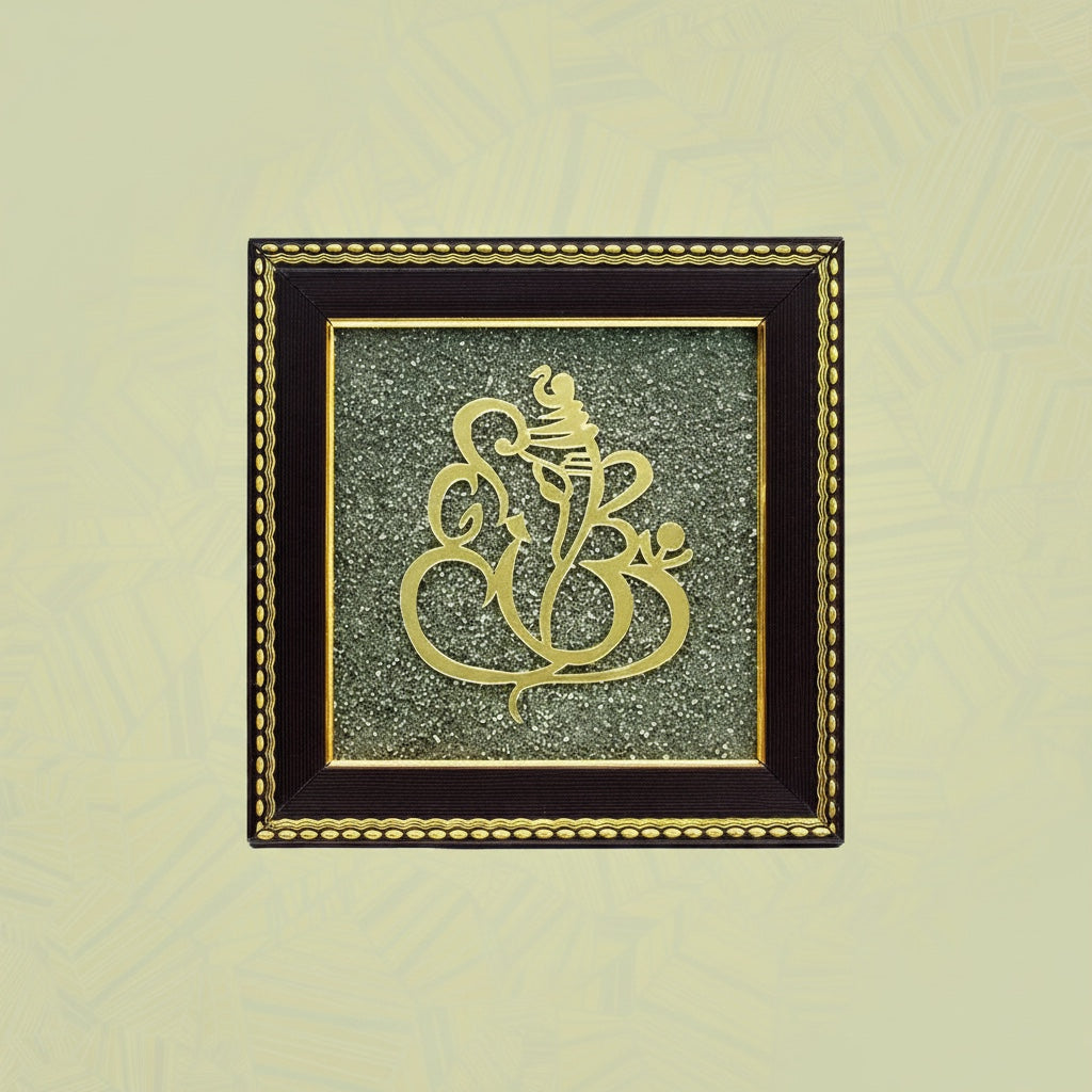 VASTUKOSHA Vighnaharta Ganesh wall frame featuring a gold-toned Ganesha silhouette set against textured raw pyrite.