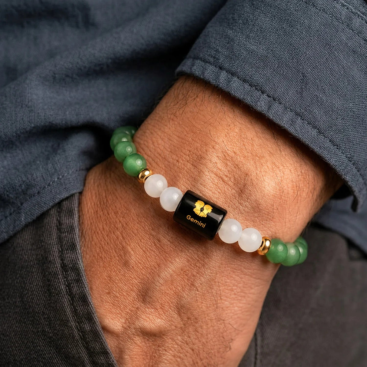VASTUKOSHA Gemini zodiac bracelet featuring green aventurine and milky quartz beads with a central black Gemini charm