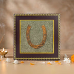 VASTUKOSHA Ghode Ki Naal horseshoe mounted on a sparkling raw pyrite frame, displayed as Vastu-inspired home decor.
