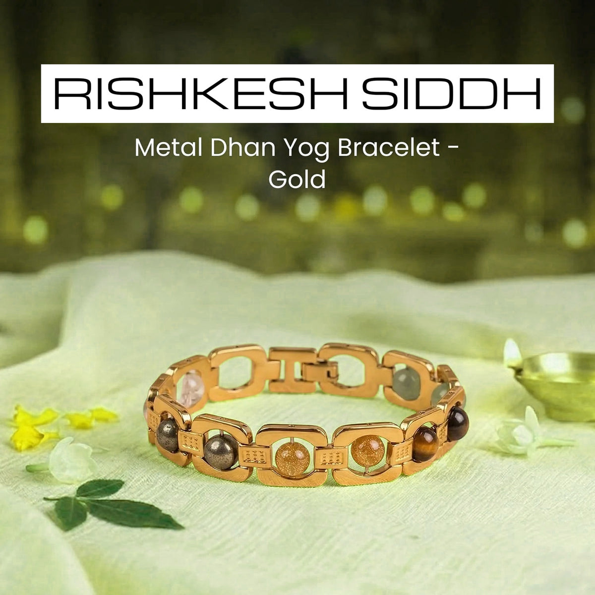 VASTUKOSHA gold-toned metal Dhan Yog bracelet featuring six authentic crystals on a white cloth with a diya lamp