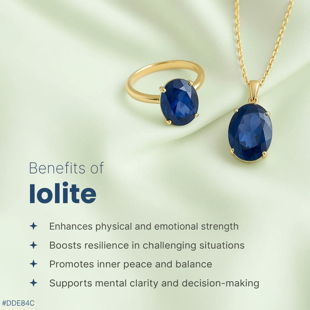 VASTUKOSHA natural iolite oval gemstone ring and pendant set in gold on a soft green fabric background.