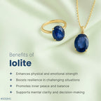 VASTUKOSHA natural iolite oval gemstone ring and pendant set in gold on a soft green fabric background.