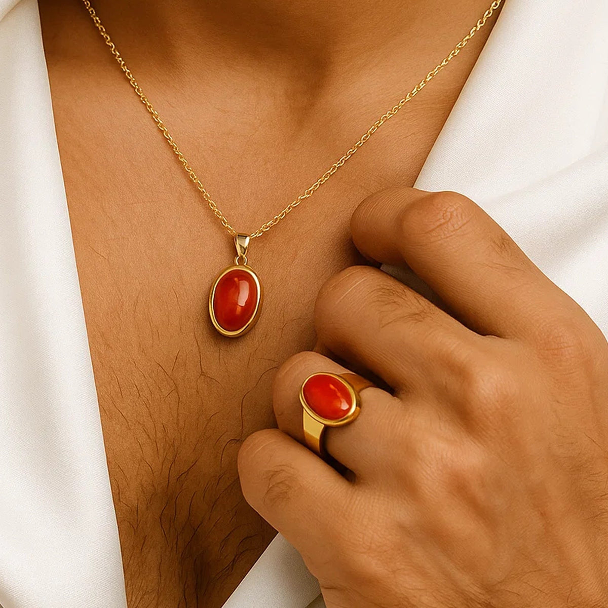 VASTUKOSHA Italian red coral gemstone pendant and ring set worn by a man in a white shirt for Jyotish practice.