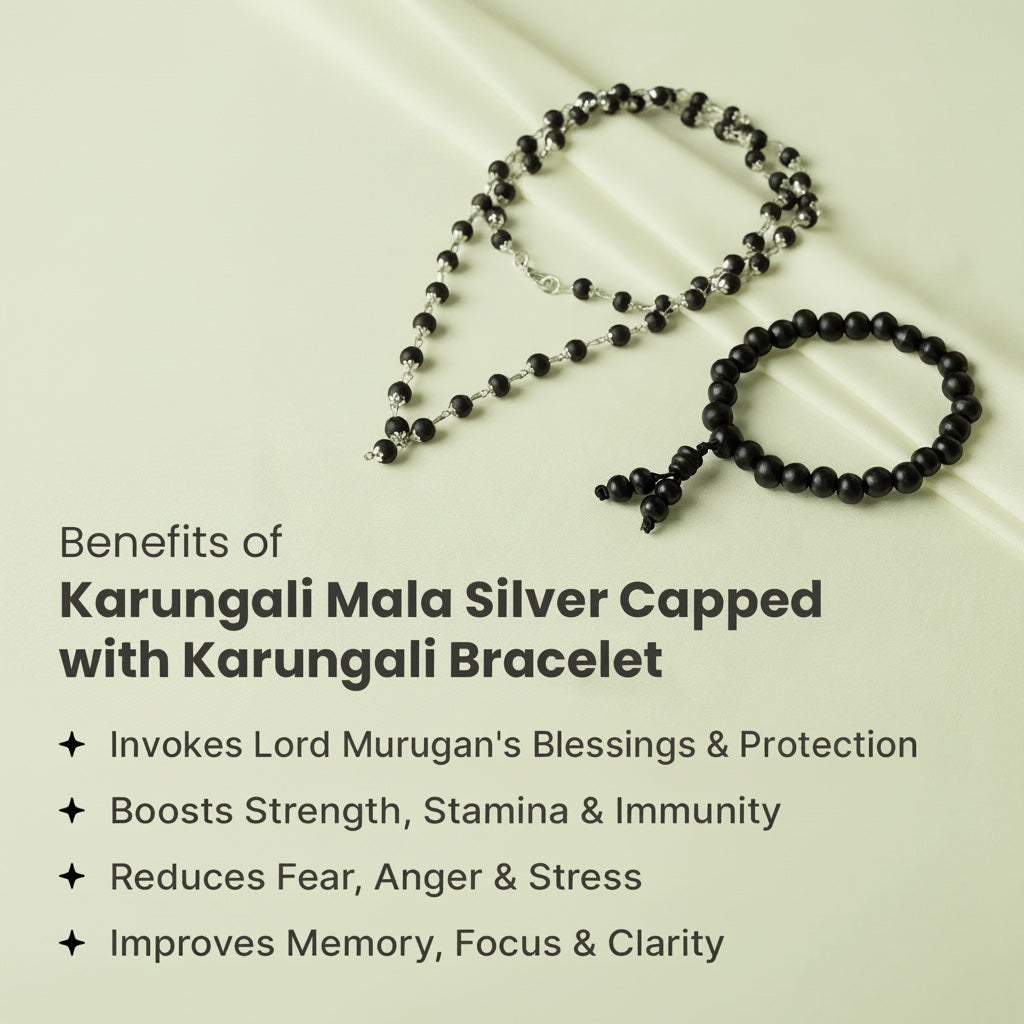 VASTUKOSHA Karungali Mala with silver-plated caps and matching black ebony wood bracelet on a light green background.