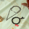 VASTUKOSHA Karungali Mala with silver-plated caps and matching black ebony wood bracelet for spiritual wear.