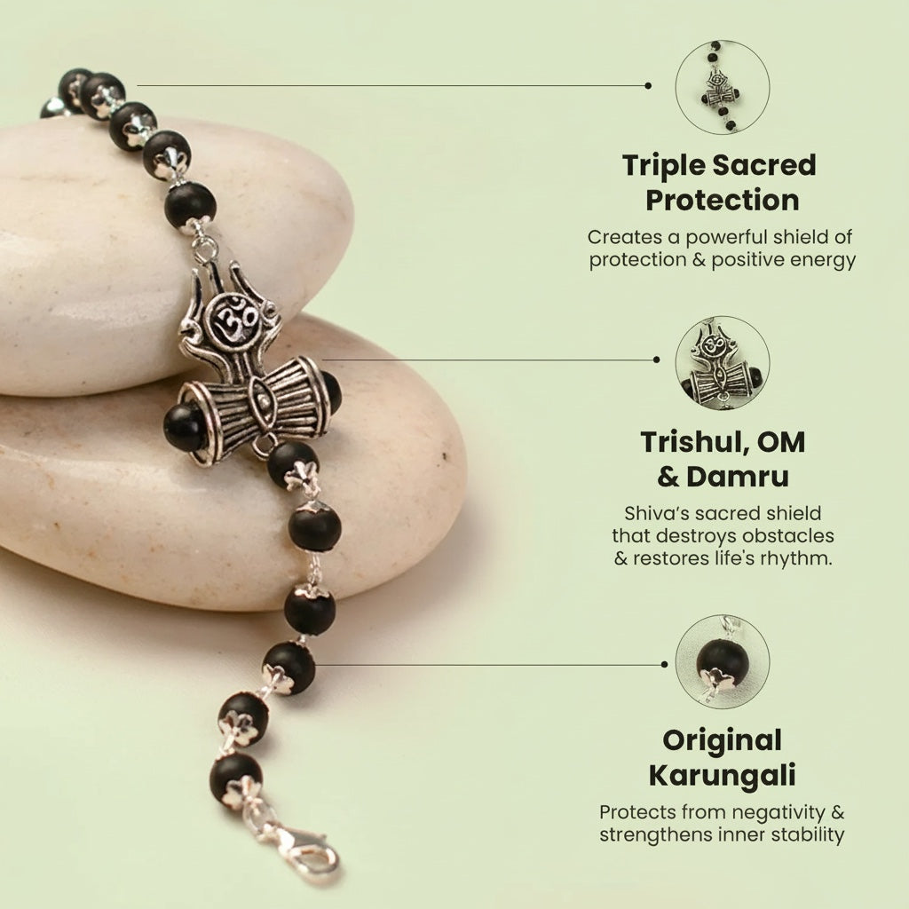 VASTUKOSHA Om Trinetra Trishul Damru Karungali bracelet with black ebony wood beads and silver Shiva-inspired charms.