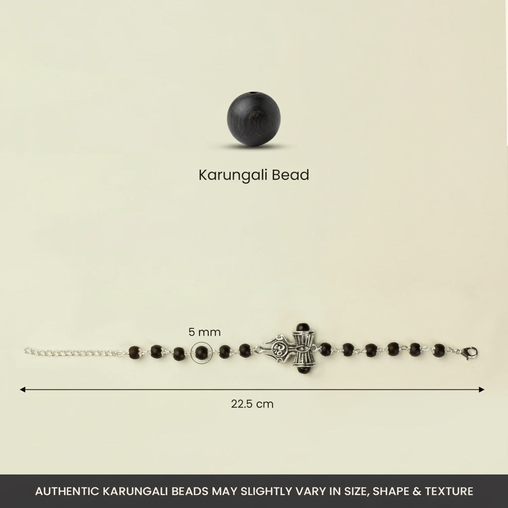 VASTUKOSHA Karungali ebony wood bead bracelet with silver-tone Om, Trinetra, Trishul, and Damru Shiva symbols.