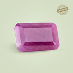 VASTUKOSHA natural African ruby gemstone with a rectangular cut and vibrant deep pinkish-red hue.
