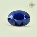 VASTUKOSHA natural blue Neelam gemstone with oval cut and government certified seal on a light background