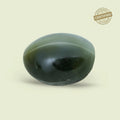 VASTUKOSHA natural green cat's eye gemstone with chatoyancy effect, certified for spiritual and astrological practice.