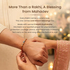 VASTUKOSHA OM Rudraksha Rakhi featuring a 5 Mukhi Rudraksha bead and sacred OM symbol tied on a brother's wrist.