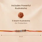 VASTUKOSHA OM Rudraksha Rakhi featuring a 5 Mukhi Rudraksha bead and a sacred OM charm on a traditional red and yellow thread.