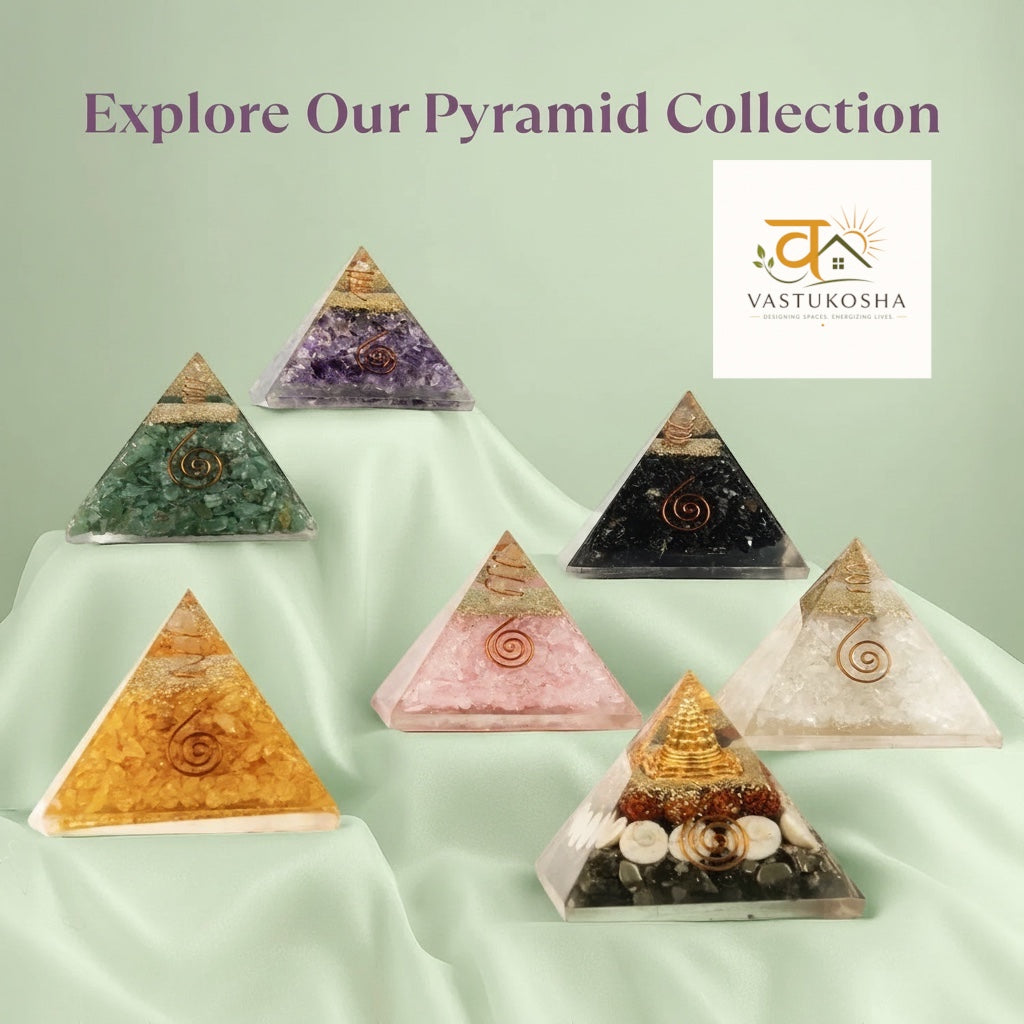 VASTUKOSHA collection of orgonite crystal pyramids featuring amethyst, quartz, and copper coils on draped fabric.