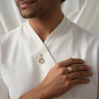 VASTUKOSHA Peetambari Neelam gemstone pendant and ring set worn by a man in a white shirt for a traditional look.