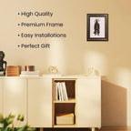 VASTUKOSHA Siddh Pyrite Hanuman Ji idol mounted on a white Selenite frame, displayed on a minimalist wall.
