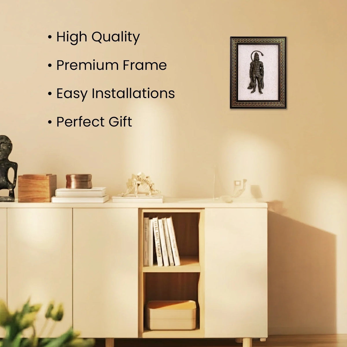 VASTUKOSHA Siddh Pyrite Hanuman Ji idol mounted on a white Selenite frame, displayed on a minimalist wall.