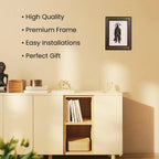 VASTUKOSHA Pyrite Hanuman Ji figurine mounted on a white Selenite frame, displayed on a wall above a wooden console.