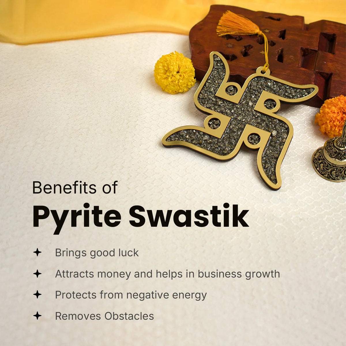 VASTUKOSHA Pyrite Swastik decorative symbol filled with natural metallic pyrite chips for Vastu and spiritual home decor.