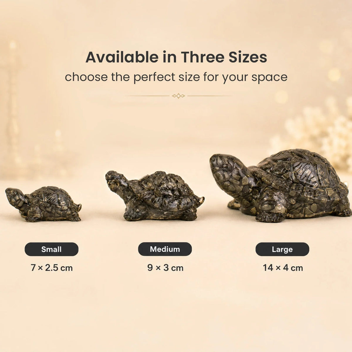 Three VASTUKOSHA pyrite tortoises in small, medium, and large sizes displayed on a neutral surface for Vastu decor.