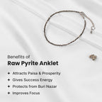 VASTUKOSHA raw pyrite anklet with metallic beads on white fabric, promoting prosperity and focus.