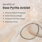 VASTUKOSHA raw pyrite anklet on a white fabric surface with text listing prosperity and focus benefits