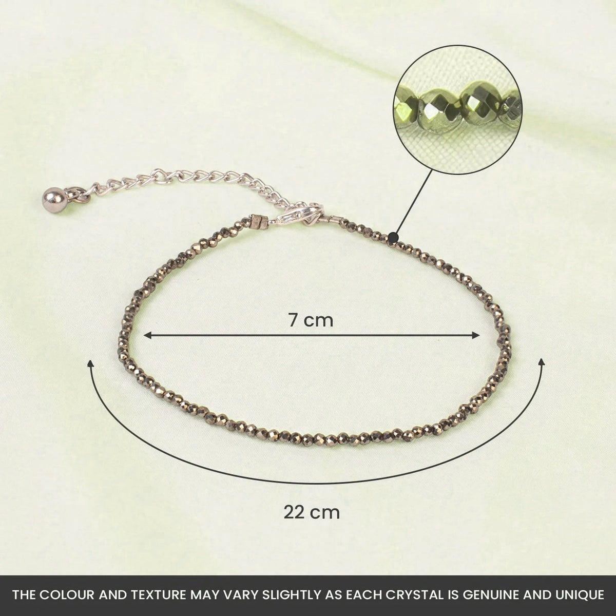 VASTUKOSHA Rishikesh Siddh raw pyrite anklet with faceted metallic beads on a white fabric background