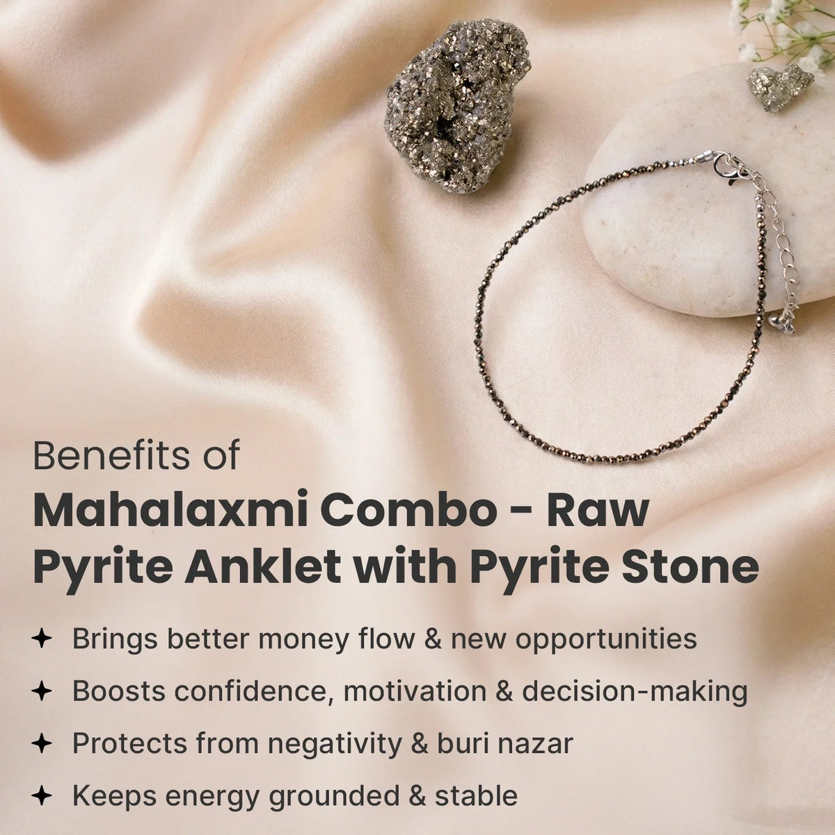 VASTUKOSHA Mahalaxmi Combo featuring a raw metallic pyrite stone and a delicate pyrite bead anklet on silk fabric.