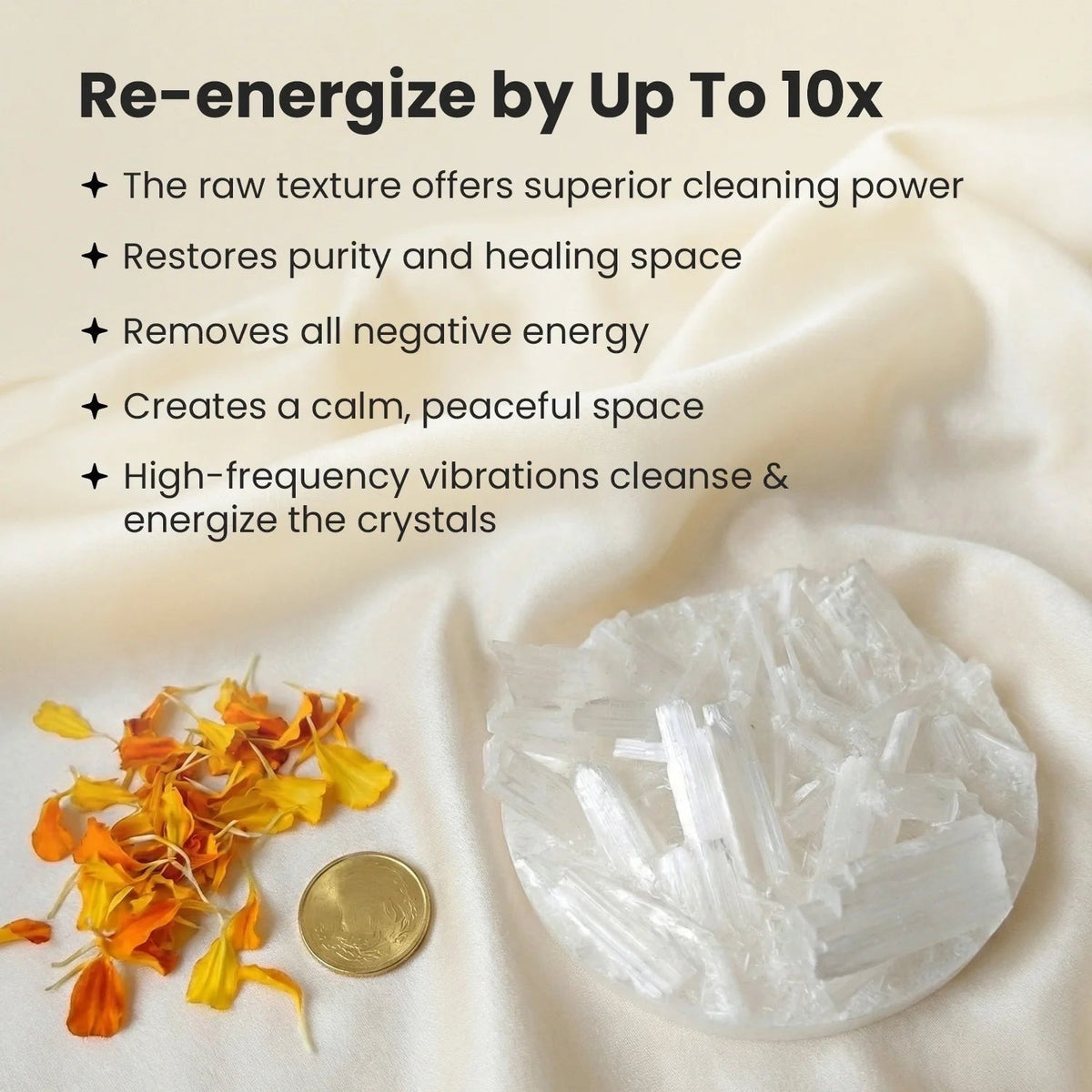 VASTUKOSHA raw selenite charging plate with white crystal shards, marigold petals, and a coin on a silk fabric background