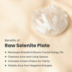 VASTUKOSHA raw selenite plate for crystal cleansing and recharging on a soft beige fabric background