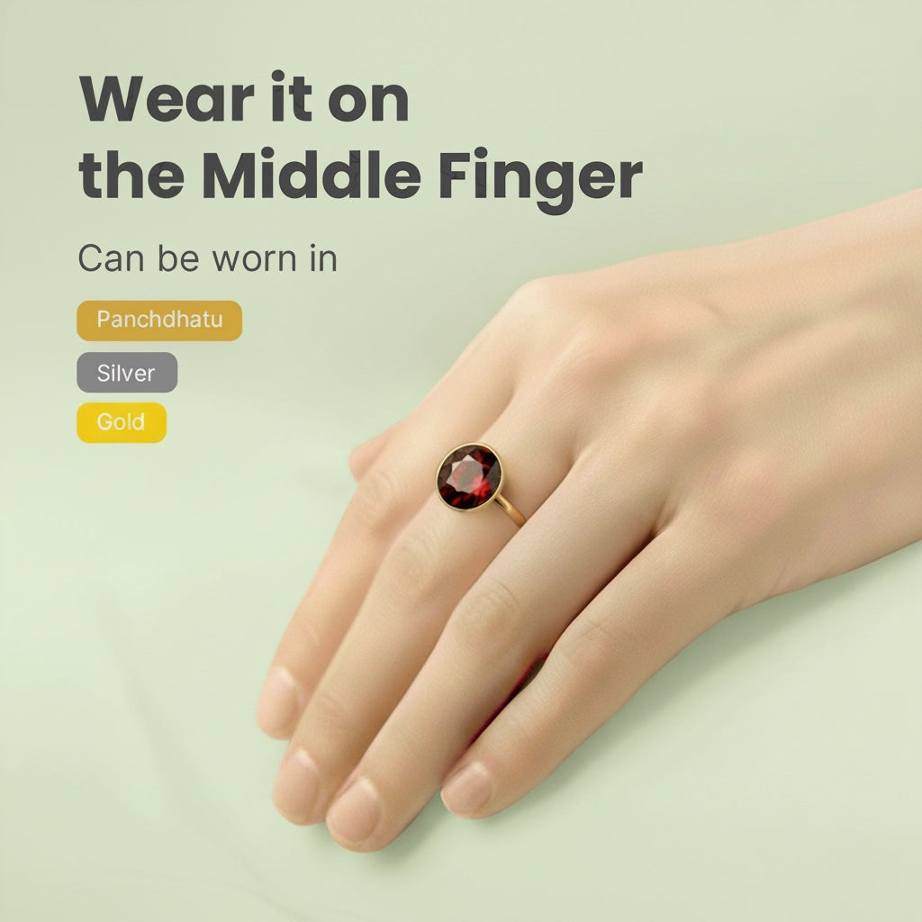 VASTUKOSHA natural deep red garnet gemstone ring worn on a finger, suitable for gold, silver, or panchdhatu settings.