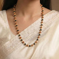 VASTUKOSHA Divya Raksha Mala featuring 5 Mukhi Rudraksha and black Karungali beads with oxidised silver-plated caps.