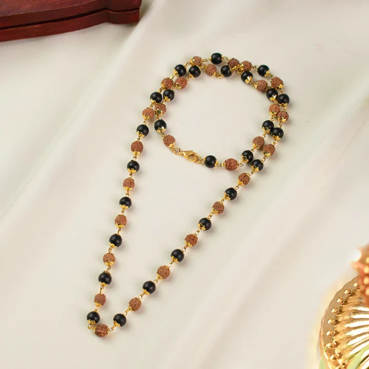 VASTUKOSHA Divya Raksha mala featuring alternating 5 Mukhi Rudraksha and black Karungali beads with silver-plated caps.